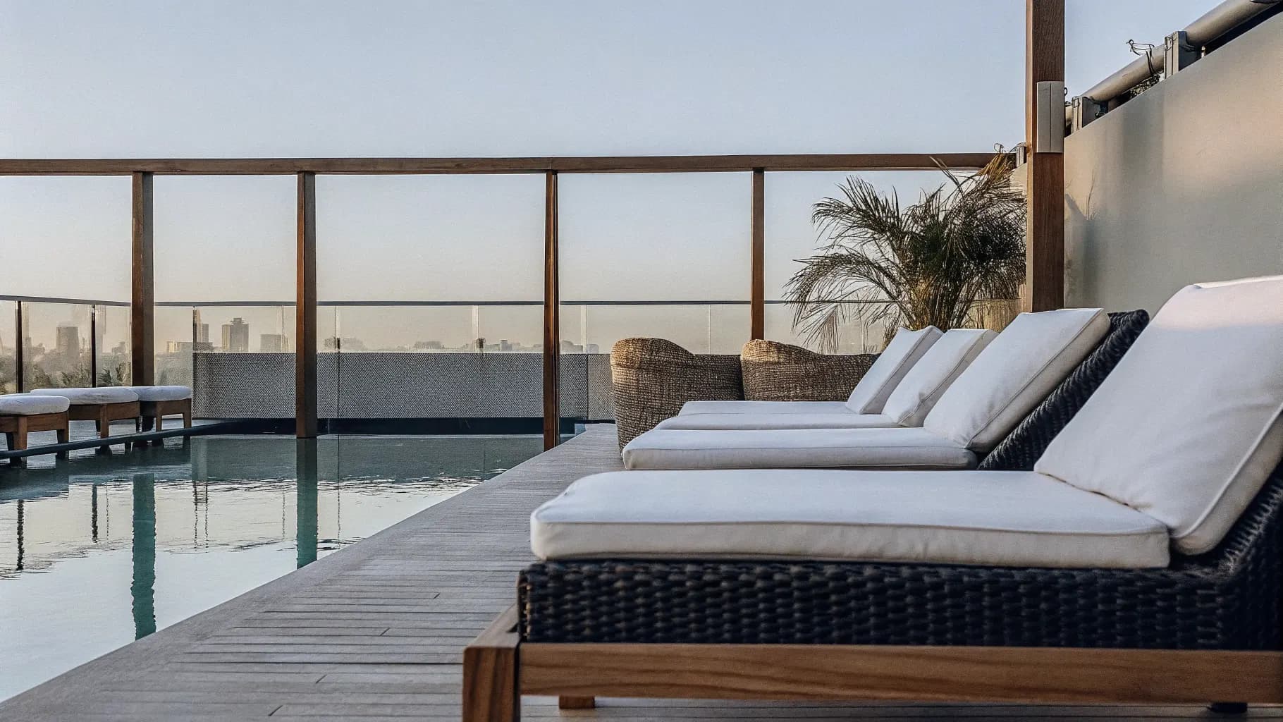 Luxury hotel rooftop pool representing aspirational hospitality brand experience