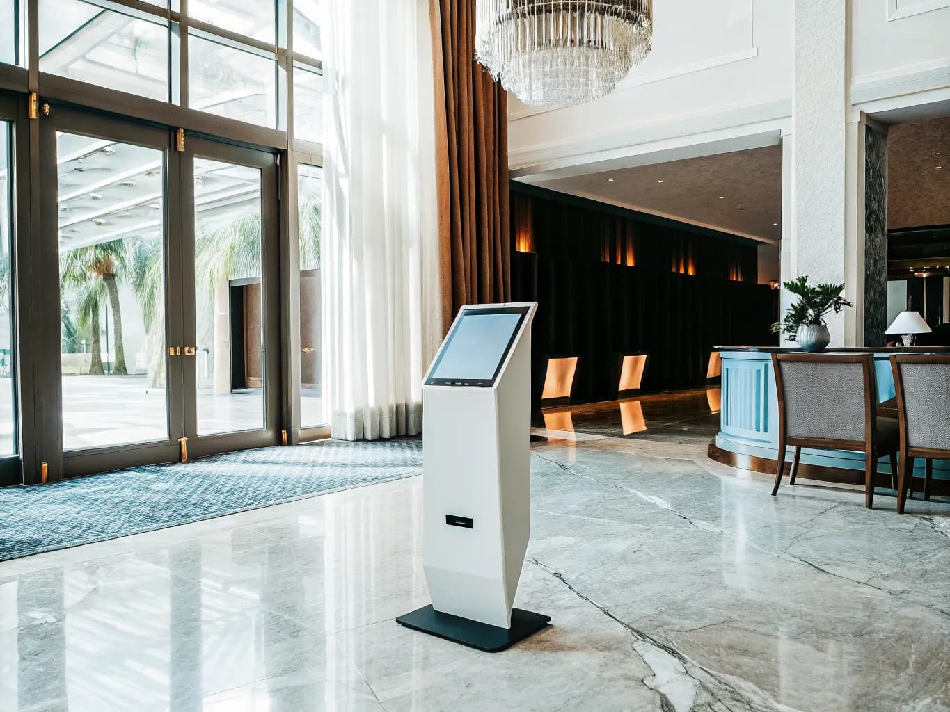 Elegant hotel lobby with marble floors and warm ambient lighting