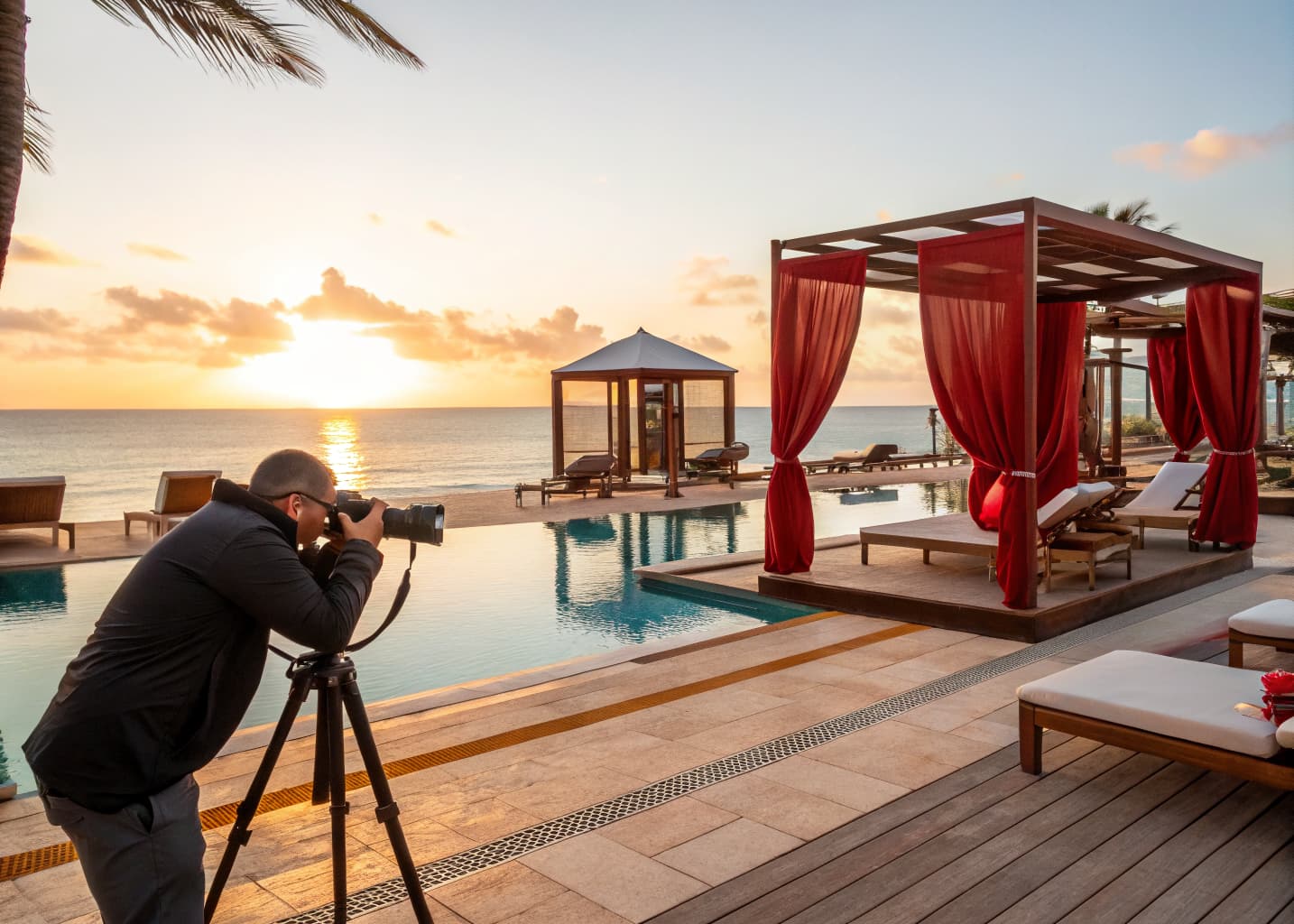 Resort brand and visual storytelling: photographer shooting a styled pool deck and cabana at golden hour