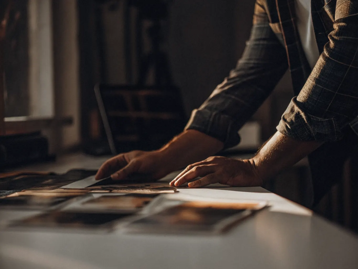 Creative director reviewing premium hotel brand design materials
