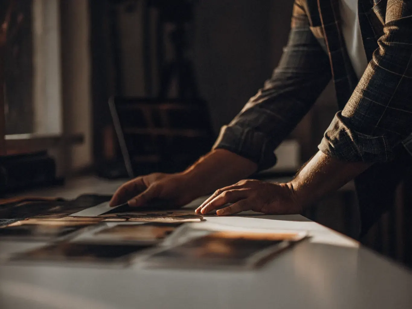 Creative director reviewing premium hotel brand graphic design materials